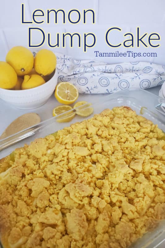 Lemon Dump Cake over a glass cake pan with lemon cake next to a bowl of lemons and a wooden spoon