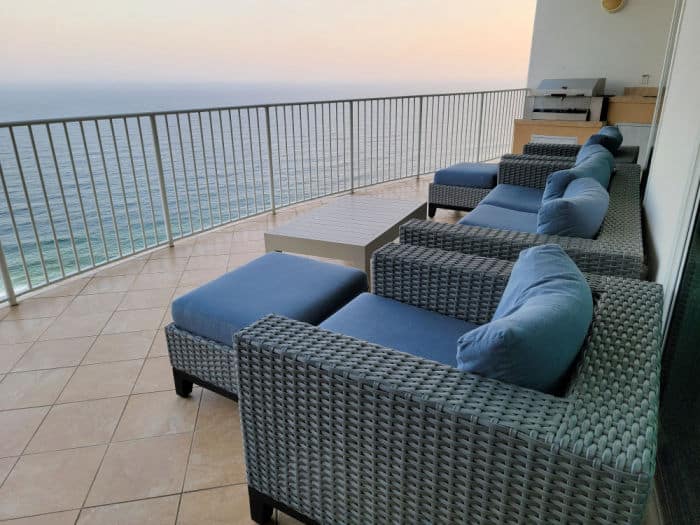 Outdoor furniture on a balcony looking out over the Gulf of Mexico 