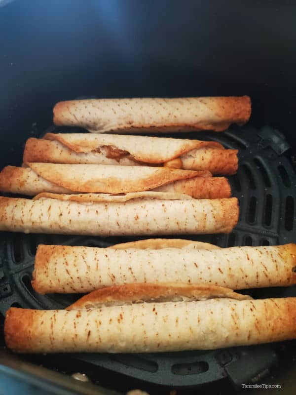 Air fried taquitos in the air fryer basket