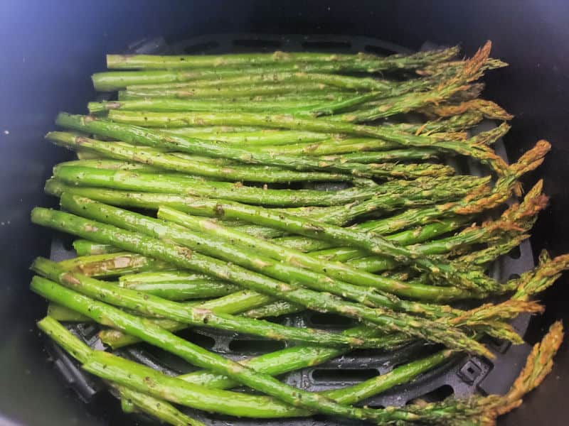air fried asparagus in the air fryer basket