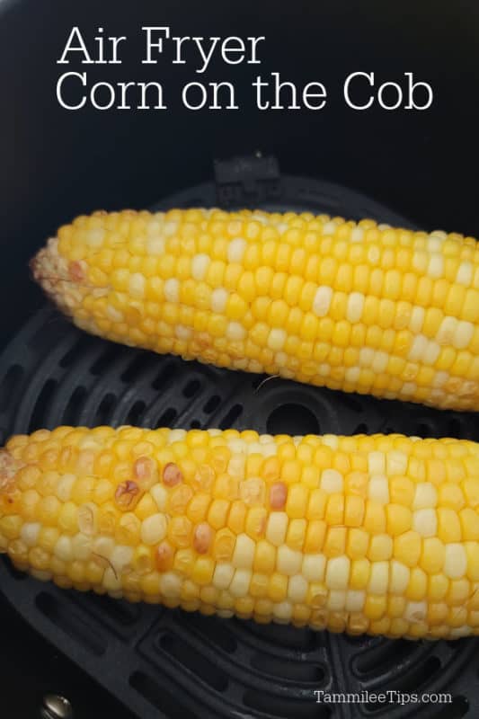 Air Fryer Corn on the Cob text over two corn cobs in an air fryer basket