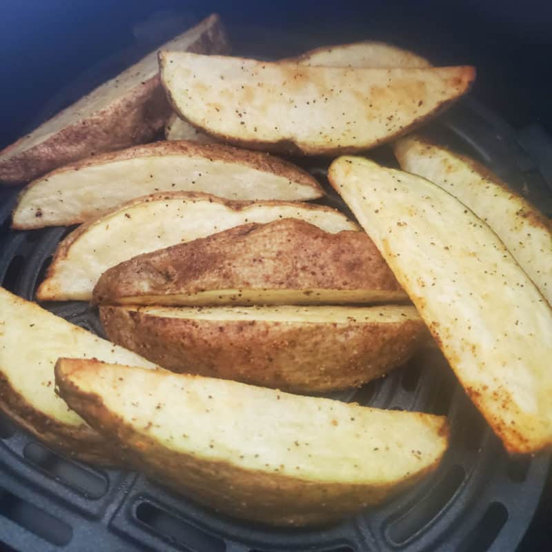 air fried potato wedges in the air fryer basket