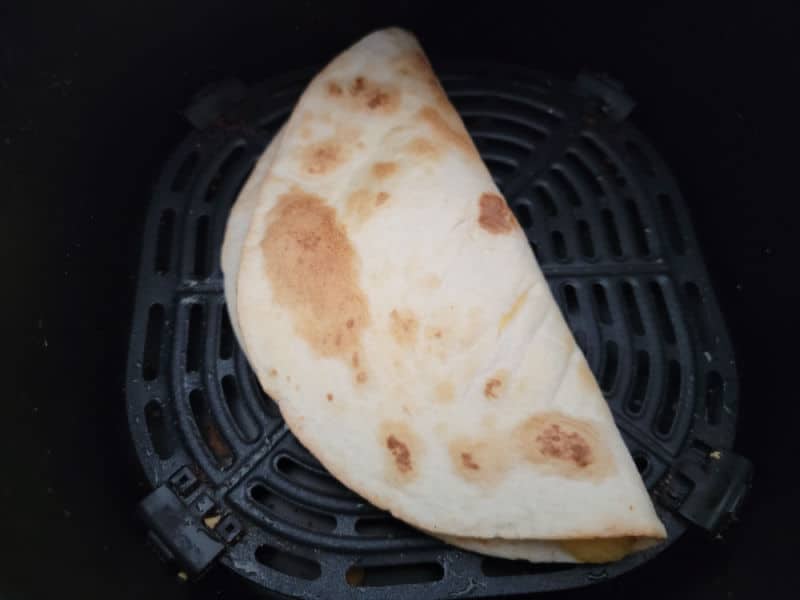 Air Fryer Quesadilla in the air fryer basket