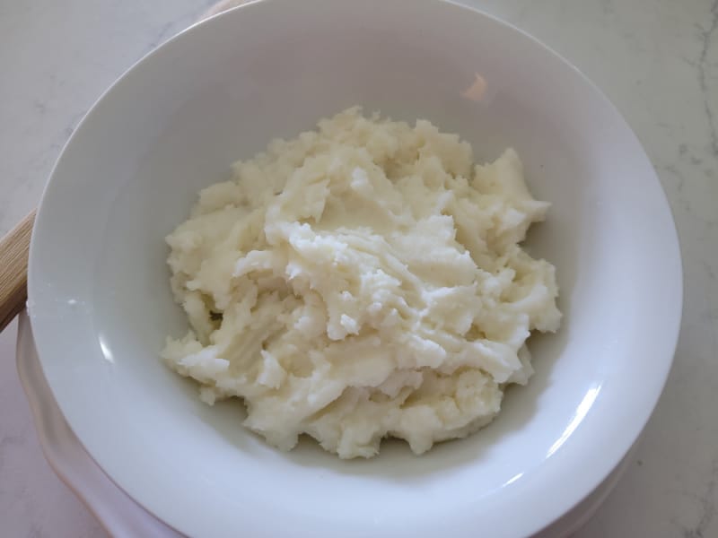 Mashed potatoes in a white bowl 