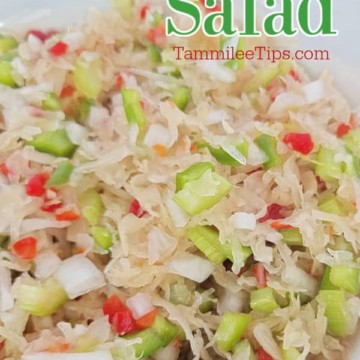 Sauerkraut Salad text over a white bowl filled with sauerkraut salad
