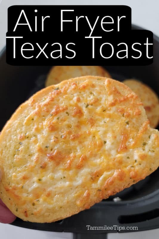 Air Fryer Texas Toast over a piece of golden brown texas toast held over the air fryer basket