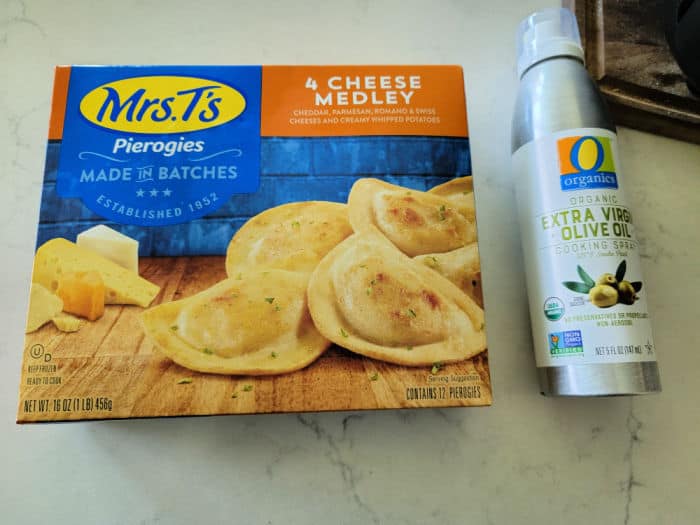 Mrs. T's pierogies 4 cheese medley box next to olive oil spray 