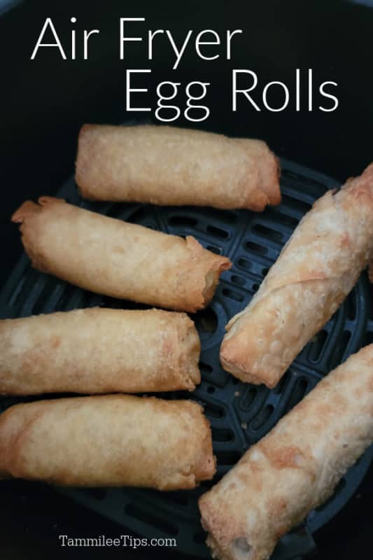 Air fryer egg rolls over air fried egg rolls in the air fryer basket. 