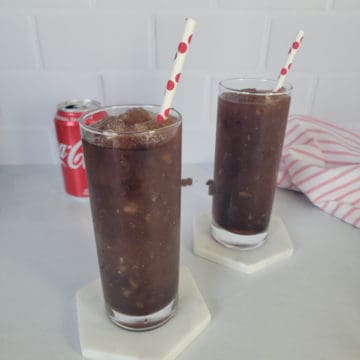 Coke Slushie Recipe with a red polka dot straw