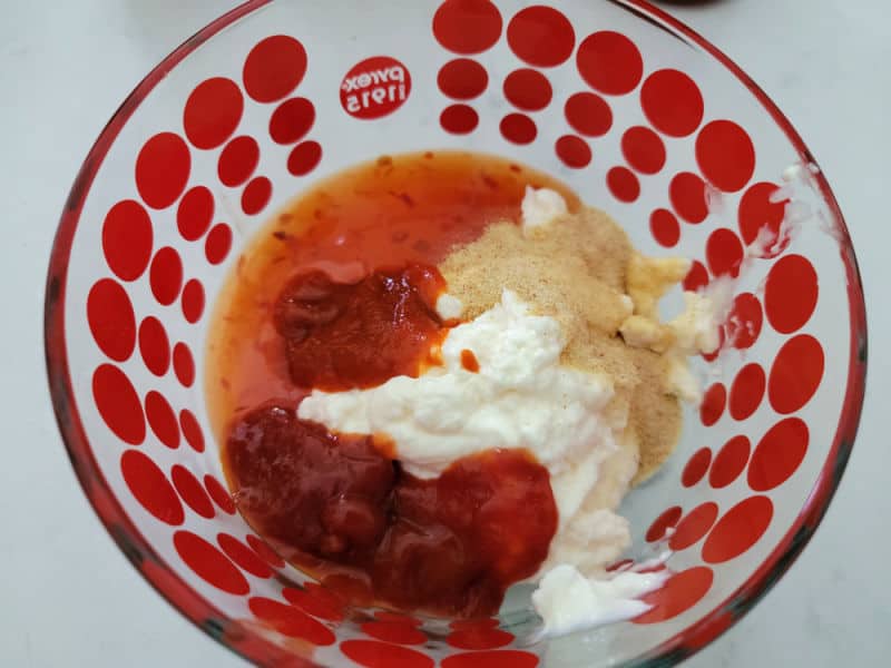 ketchup mayo and spices in a glass bowl 