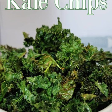Air Fryer Kale chips over a white bowl filled with air fried kale chips