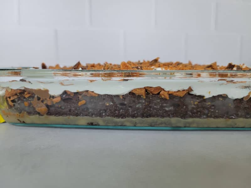 sideview of a Butterfinger poke cake