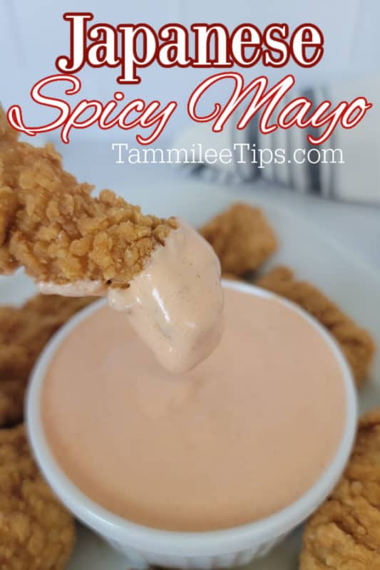 Japanese Spicy Mayo over a white bowl with a chicken tender dipping into it