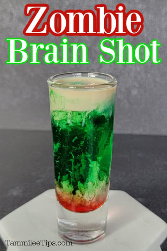 Zombie brain shot over a green, cream and red cocktail shot