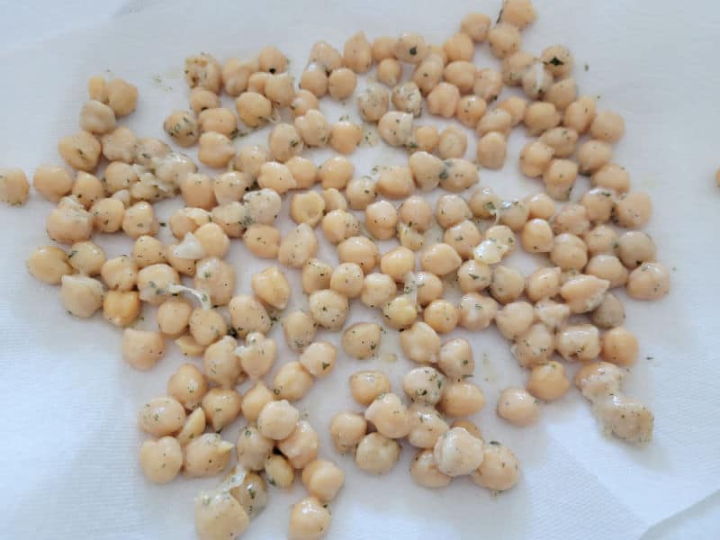 seasoned chickpeas spread on a paper towel