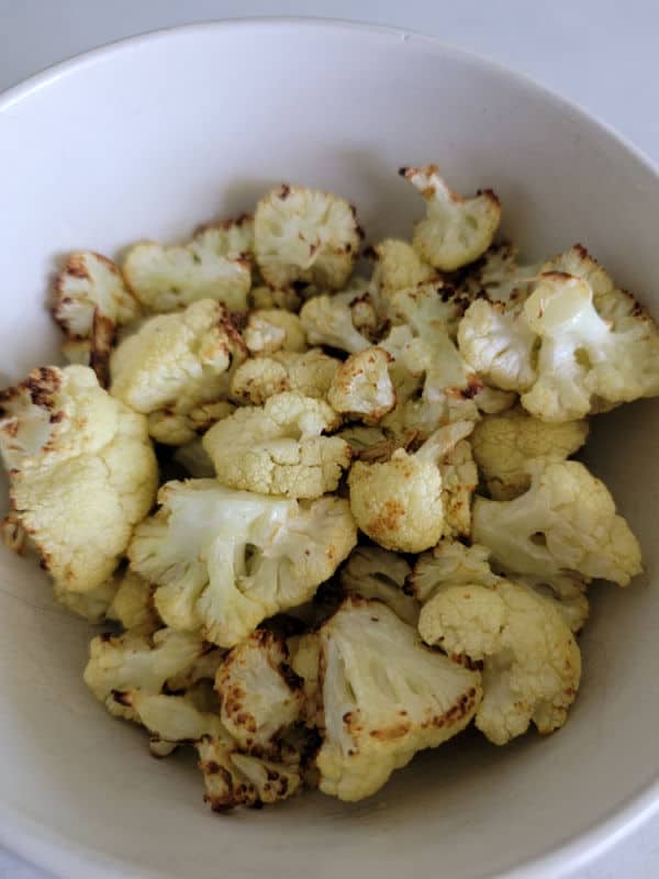 Air fried cauliflower in a white bowl 