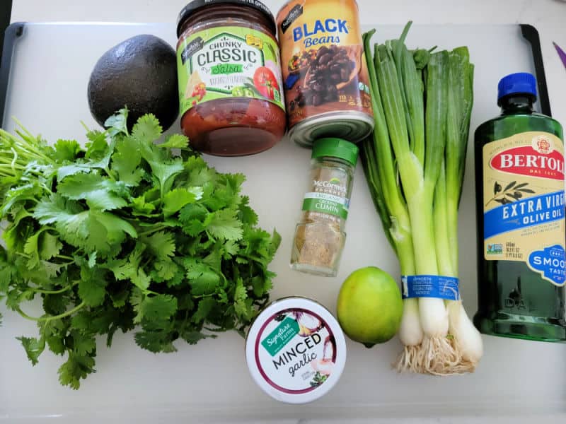 avocado, salsa, black beans, cilantro, minced garlic, ground cumin, green olive, olive oil 