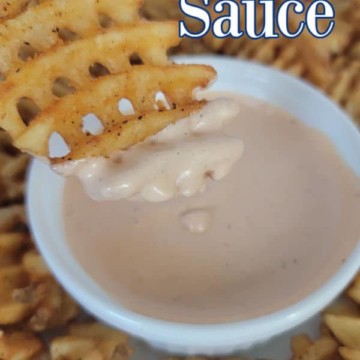 Comeback Sauce text written over a waffle fry dipping into comeback sauce in a white bowl.