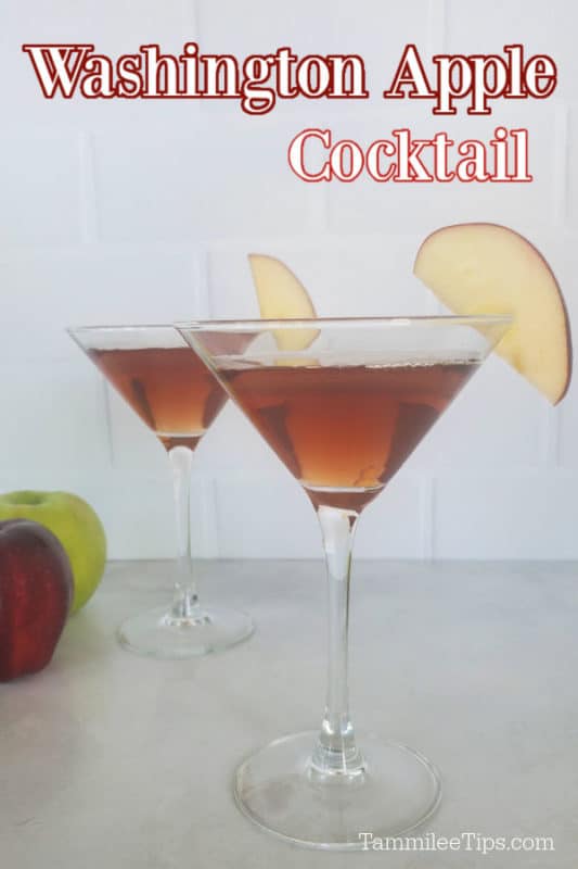 Washington Apple Cocktail over two martini glasses with apple slice garnishes