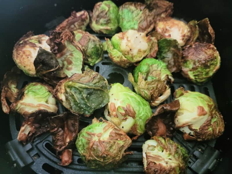 Air fried Brussel sprouts in an air fryer basket