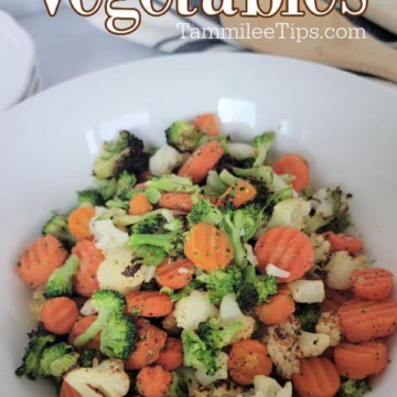 Air Fryer Vegetables text over a white bowl with carrots, broccoli, and cauliflower