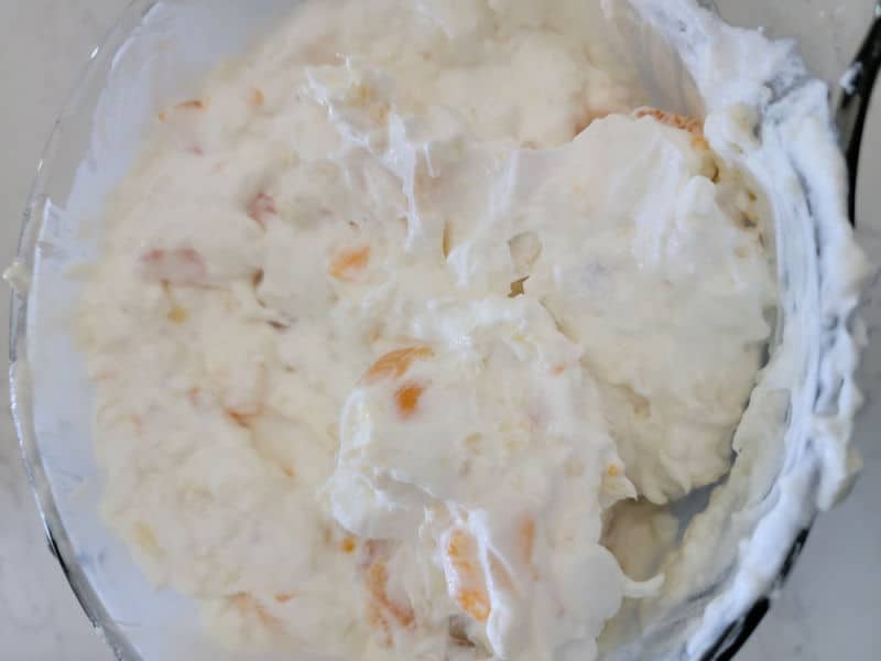 ambrosia salad in a mixing bowl 