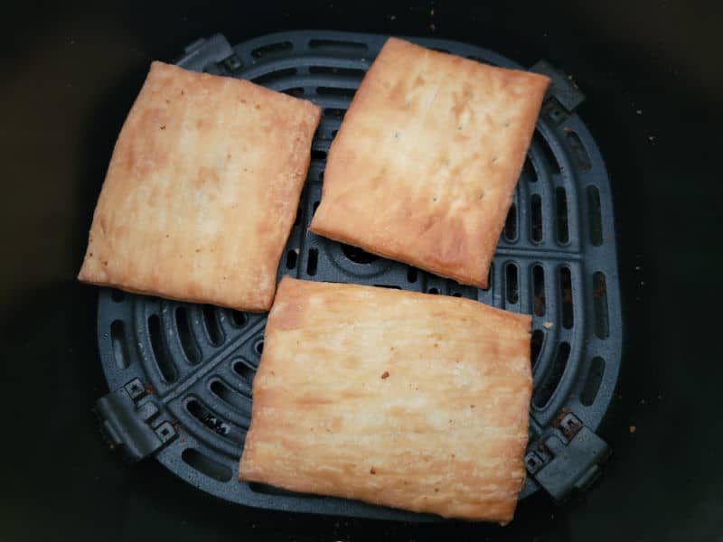air fried toaster strudel in an air fryer basket