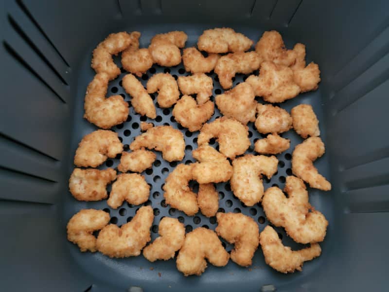 Air fried shrimp in an air fryer basket