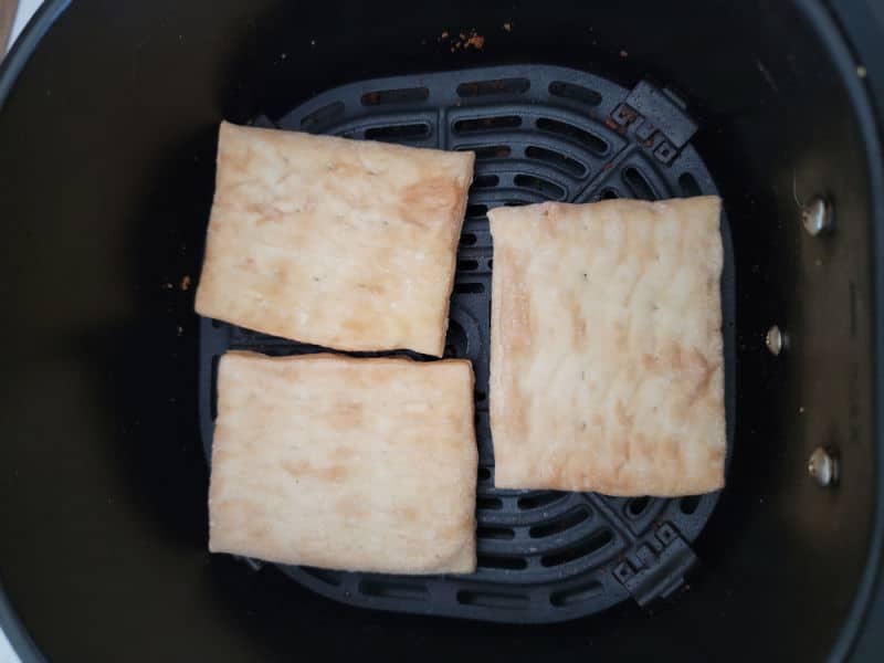 Frozen toaster strudel in an air fryer basket