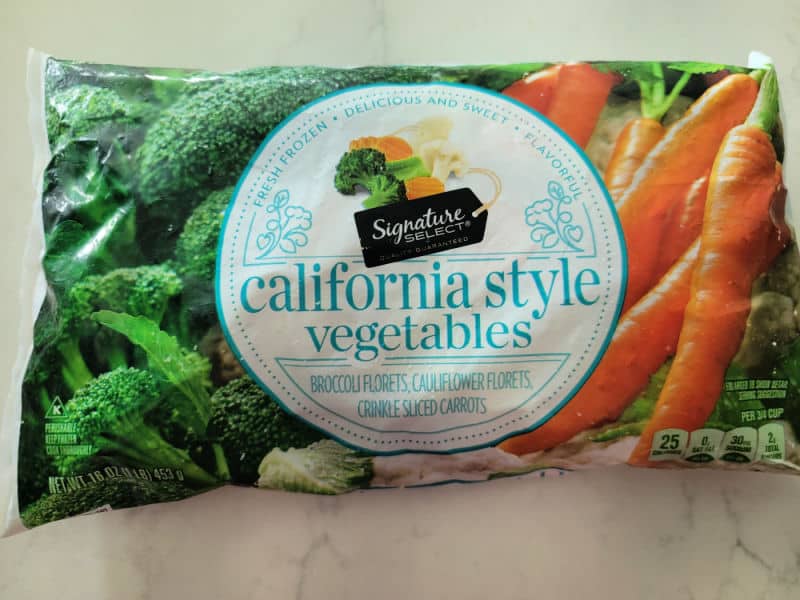 Bag of California Style vegetables showing broccoli and carrots