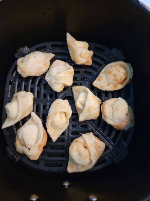 frozen cream cheese wontons in the air fryer basket