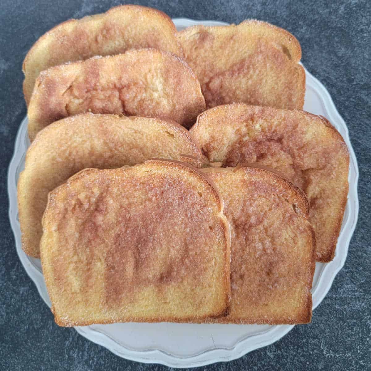 Cinnamon toast on a white plate