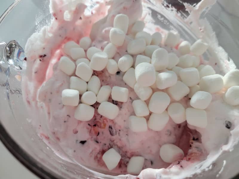 mini marshmallows on cool whip cranberry salad for cranberry fluff salad