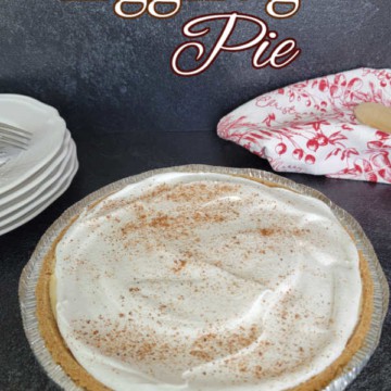 Eggnog Pie text over a eggnog pie in a pan with a red and white cloth