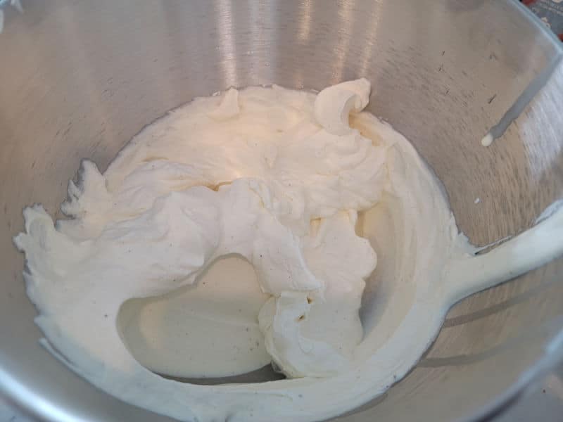 Eggnog Whipped cream in a silver mixing bowl