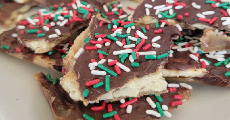 Christmas Crack Saltine Toffee with holiday sprinkles