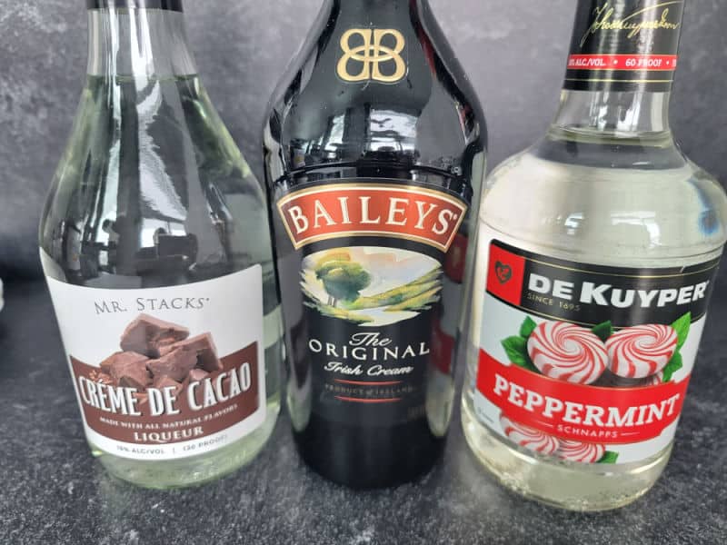 Creme de Cacao, Baileys Irish Cream, and Peppermint Schnapps bottles