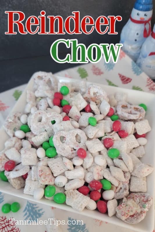 Reindeer Chow text over a white bowl filled with reindeer snack mix on a holiday cloth 