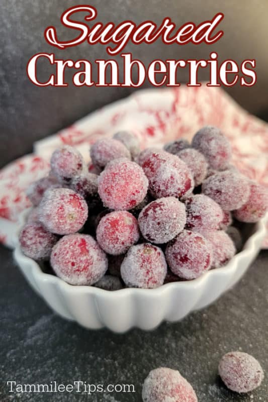 Sugared Cranberries text printed over a bowl filled with sugar coated cranberries