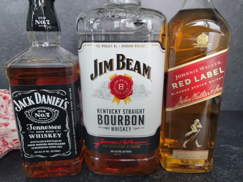 Three Wise Men Shot ingredients, Jack Daniels Tennessee Whiskey, Jim Beam Kentucky Bourbon, and Johnnie Walker Red Label Scotch Whisky