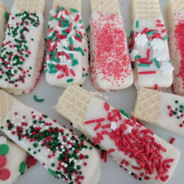 White Chocolate Dipped Sugar Wafers on a white platter