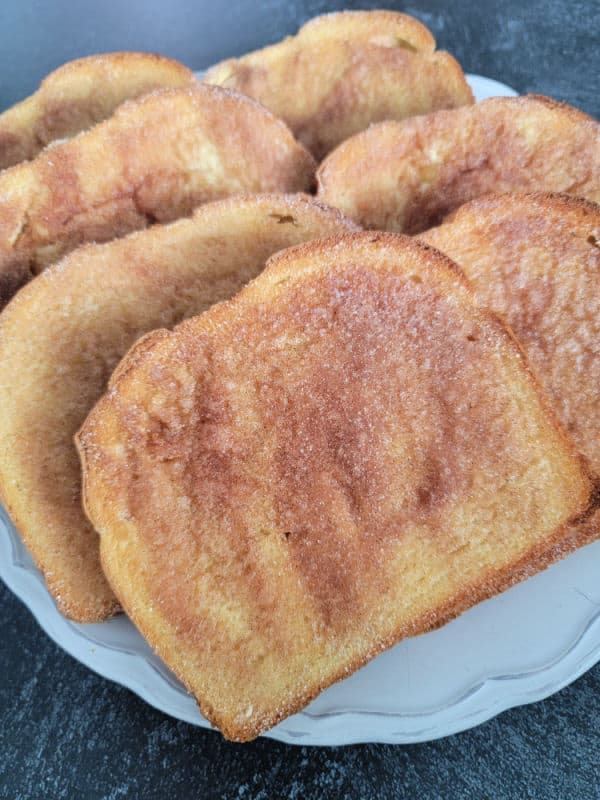 Cinnamon sugar toast on a white plate