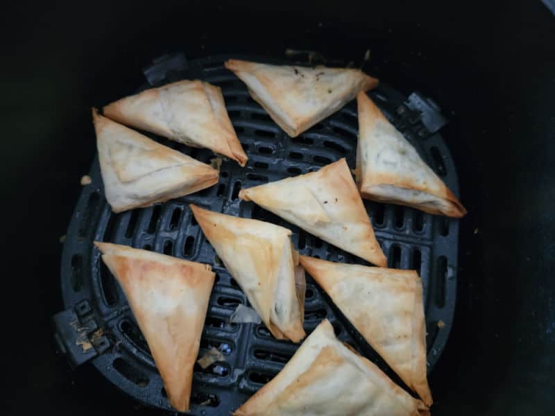 Air fried spanakopita in the air fryer basket