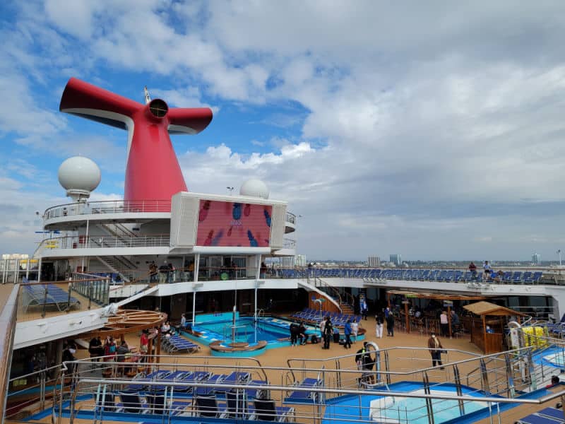 Carnival funnel over the pool deck with large movie screen