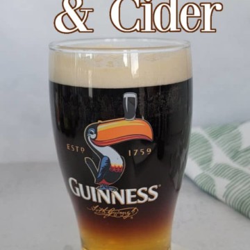 Guinness and Cider text over a Guinness glass with a layered cocktail
