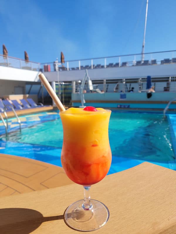 tropical cocktail next to the pool