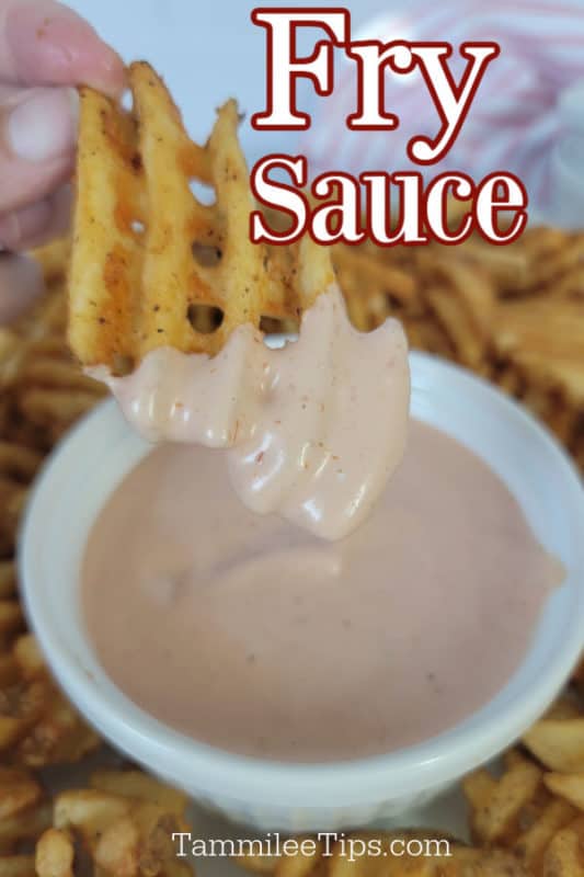 Fry Sauce text written over a waffle fry dipping fry sauce in a white bowl