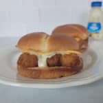 air fried fish fillet sandwich on a white plate