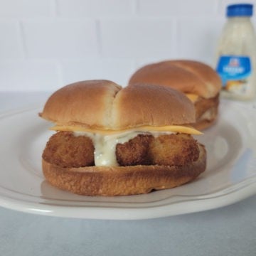 air fried fish fillet sandwich on a white plate