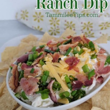Bacon Cheddar Ranch Dip text over a bowl of dip with tortilla chips